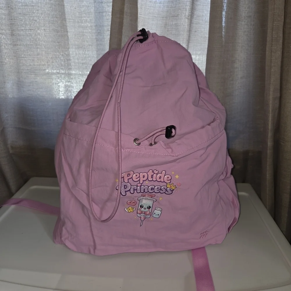 Pink all in motion Peptide Princess sling gym Backpack